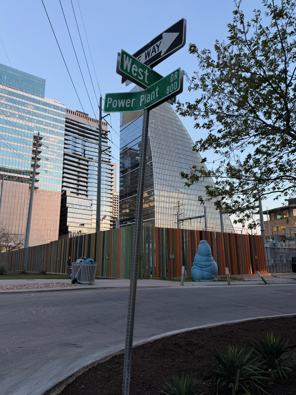 West & Power Plant Drive, Austin — downtown skyline at dusk