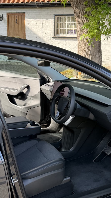 Interior view through the open driver's door