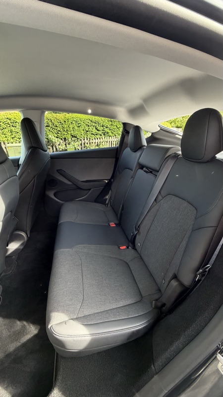 Centre touchscreen with pink Model 3 graphic